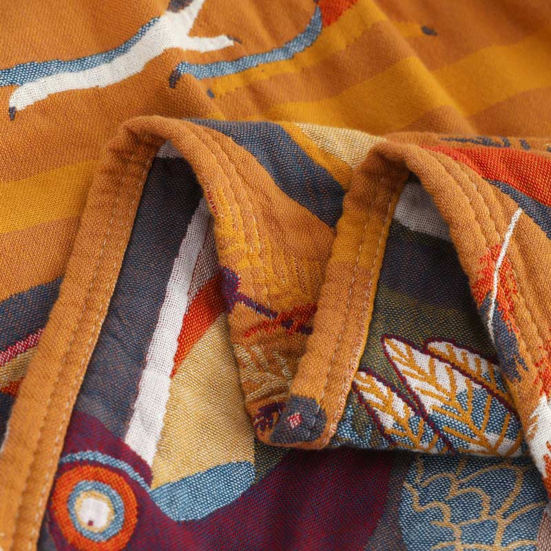 Trapunta reversibile in cotone morbido con motivo tucano