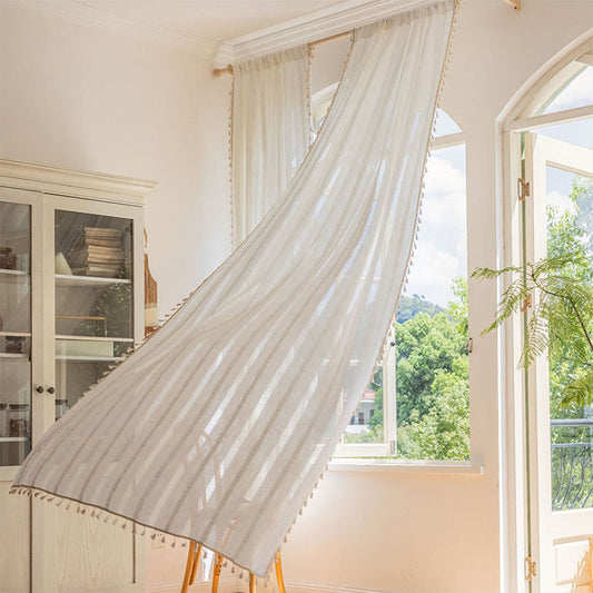 Tenda a righe semi-oscuranti con nappe traforate