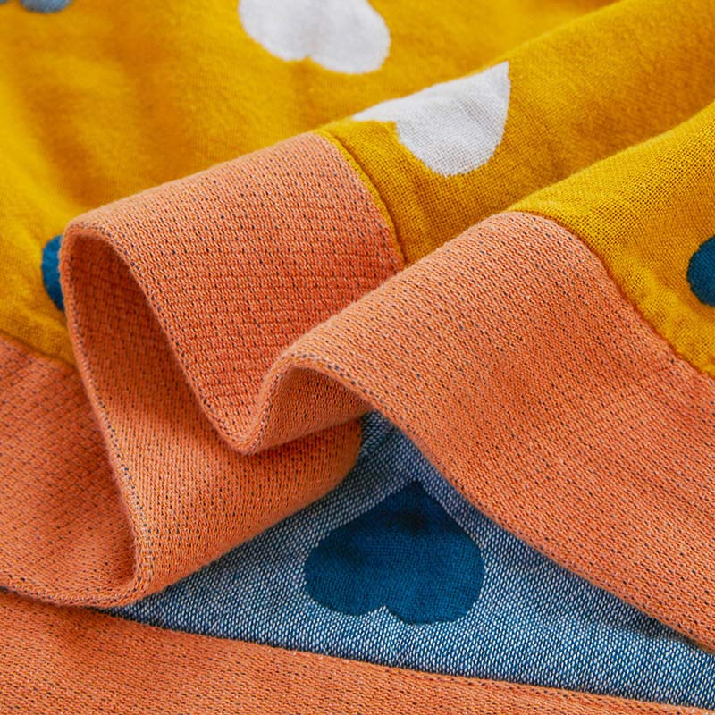 Trapunta reversibile in garza di cotone con cuori colorati