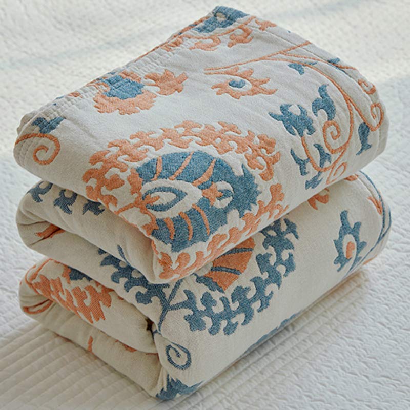 Trapunta reversibile in cotone con stampa floreale colorata