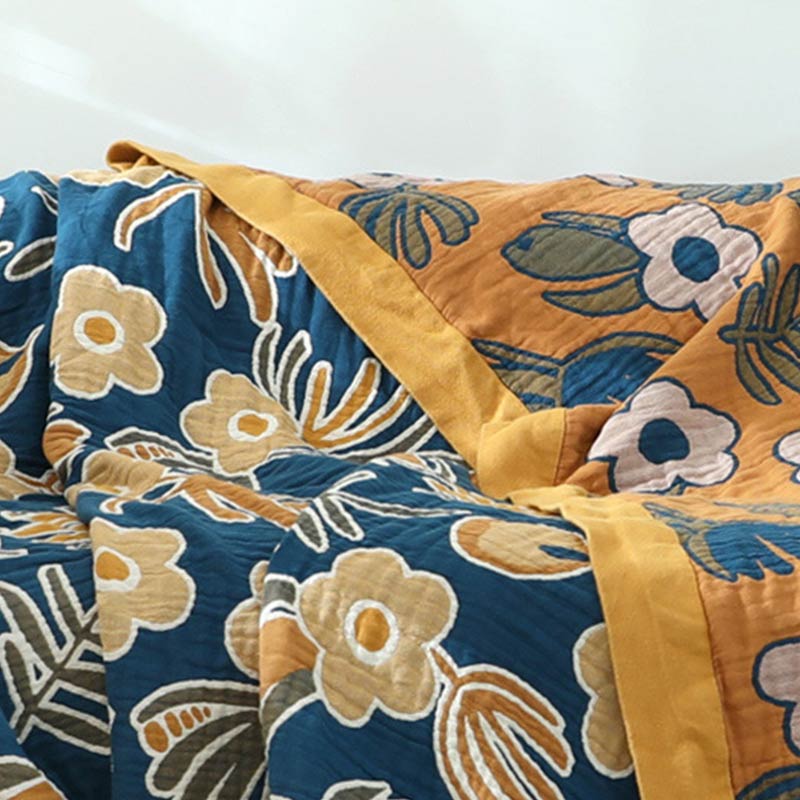 Copridivano con motivo a fiori gialli