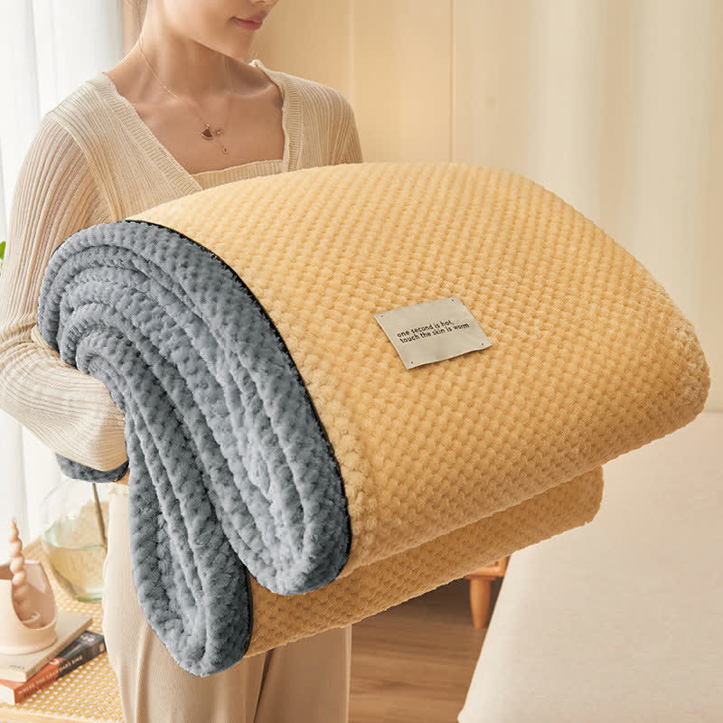 Coperta in pile morbido a tinta unita