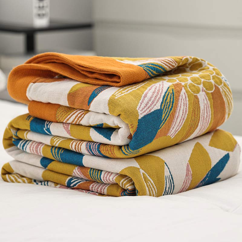 Trapunta reversibile in cotone con stampa a fiori gialli Ownkoti