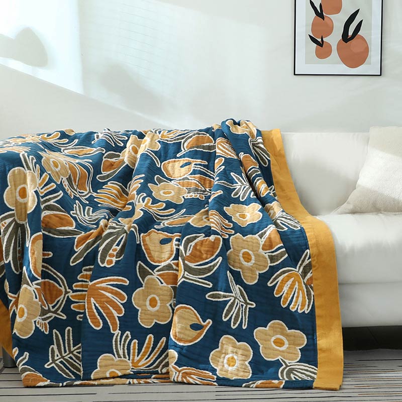 Copridivano con motivo a fiori gialli
