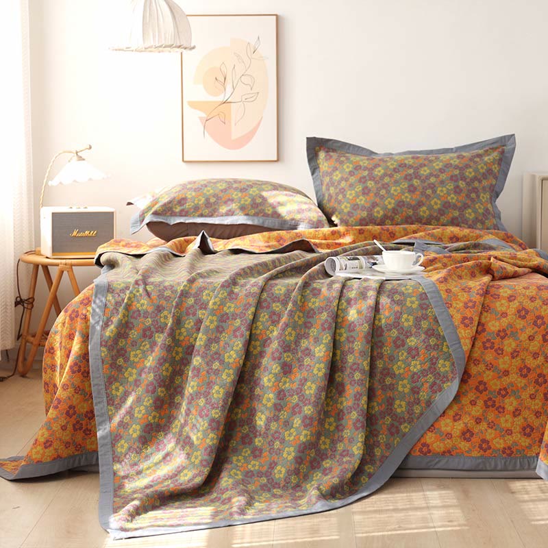 Trapunta reversibile in garza di cotone jacquard floreale