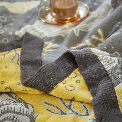 Trapunta reversibile traspirante con piante marine di corallo