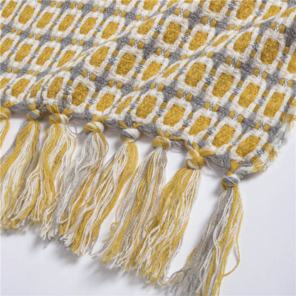 Coperta per divano lavorata a maglia Ownkoti con nappe