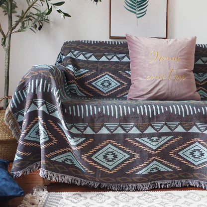 Coperta da salotto in maglia bohémien con nappa