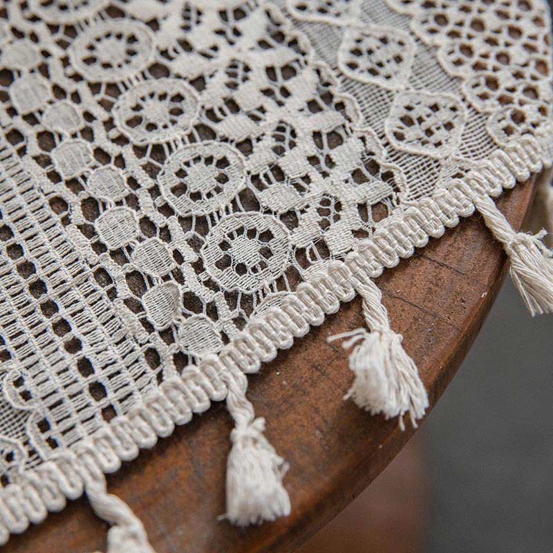 Tenda in cotone beige con nappe traforate