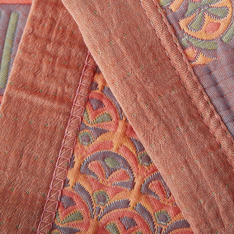 Trapunta reversibile in cotone con motivo quadrato colorato