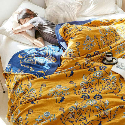 Trapunta reversibile in garza di cotone con fiori di garofano