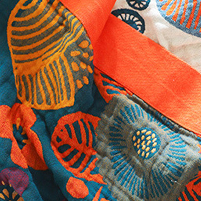 Trapunta in cotone con motivo floreale arancione Ownkoti