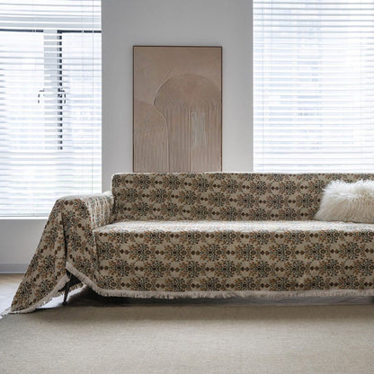 Copridivano con nappa in jacquard a fiori di prugna