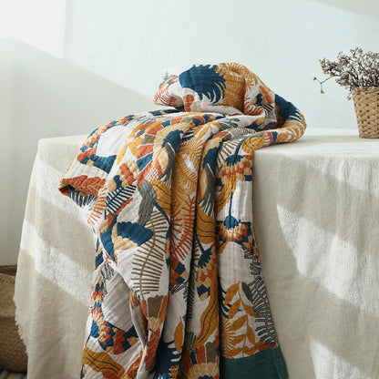 Copridivano reversibile con coperta a forma di fiore e uccello