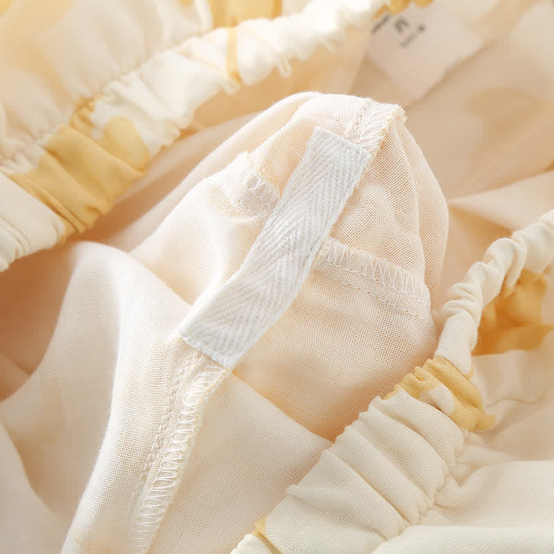Completo da casa in cotone con fiocco e foglie di ginkgo