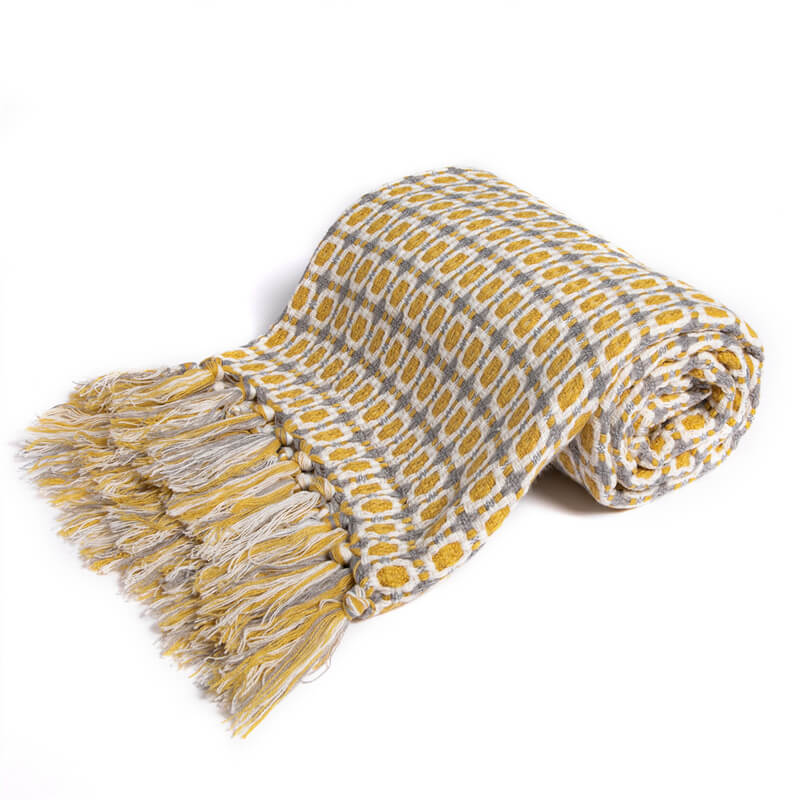 Coperta per divano lavorata a maglia Ownkoti con nappe